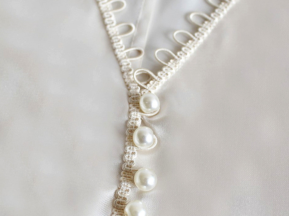 Liseré tressé avec boucles extensibles pour boutons, largeur 15 mm