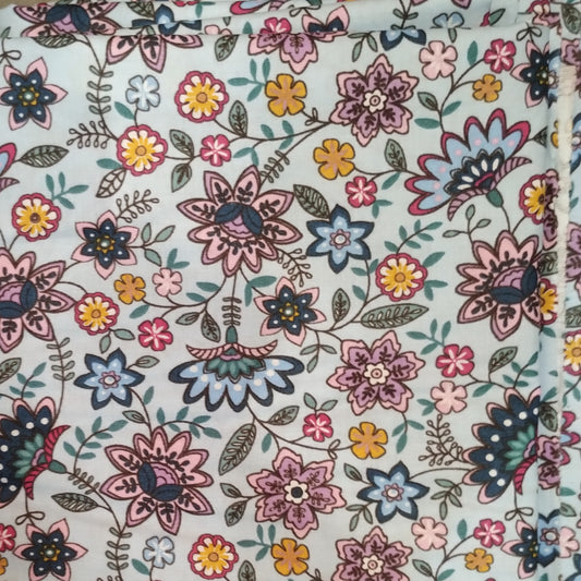 Coupon 100% coton oekotex env. 100x150cm fleurs sur fond bleu ciel